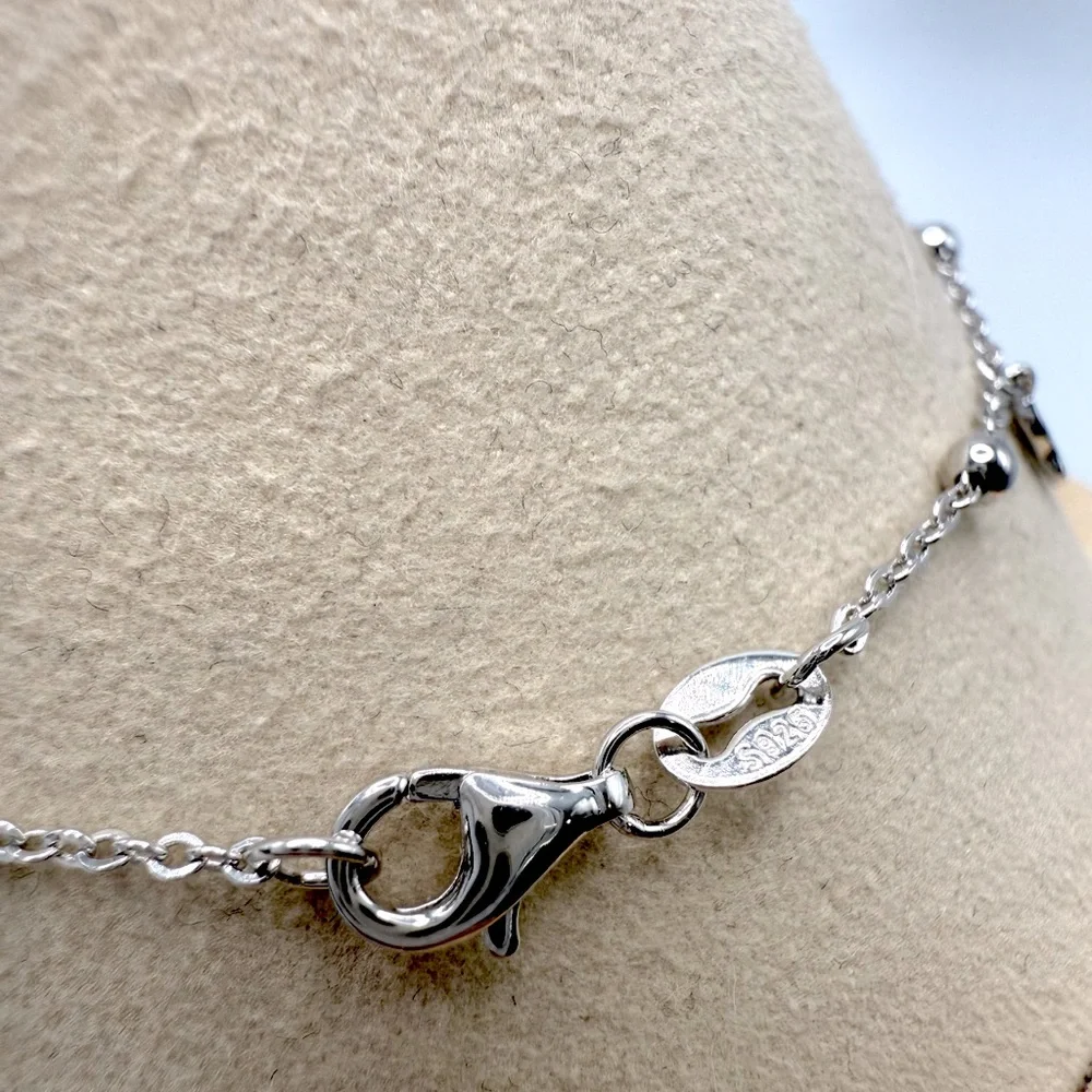 6.75” Dainty .925 Sterling Silver Dangle Eye, Cross and Hamsa Charm Bracelet